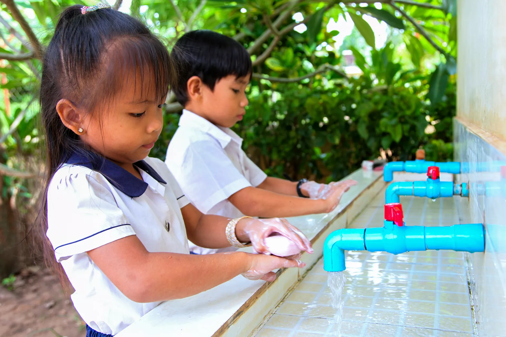 Peam Chi Kang primary school in Peam Chi Commune, Kang Meas District. Hand washing after use of toilet, a must for all children in school. 