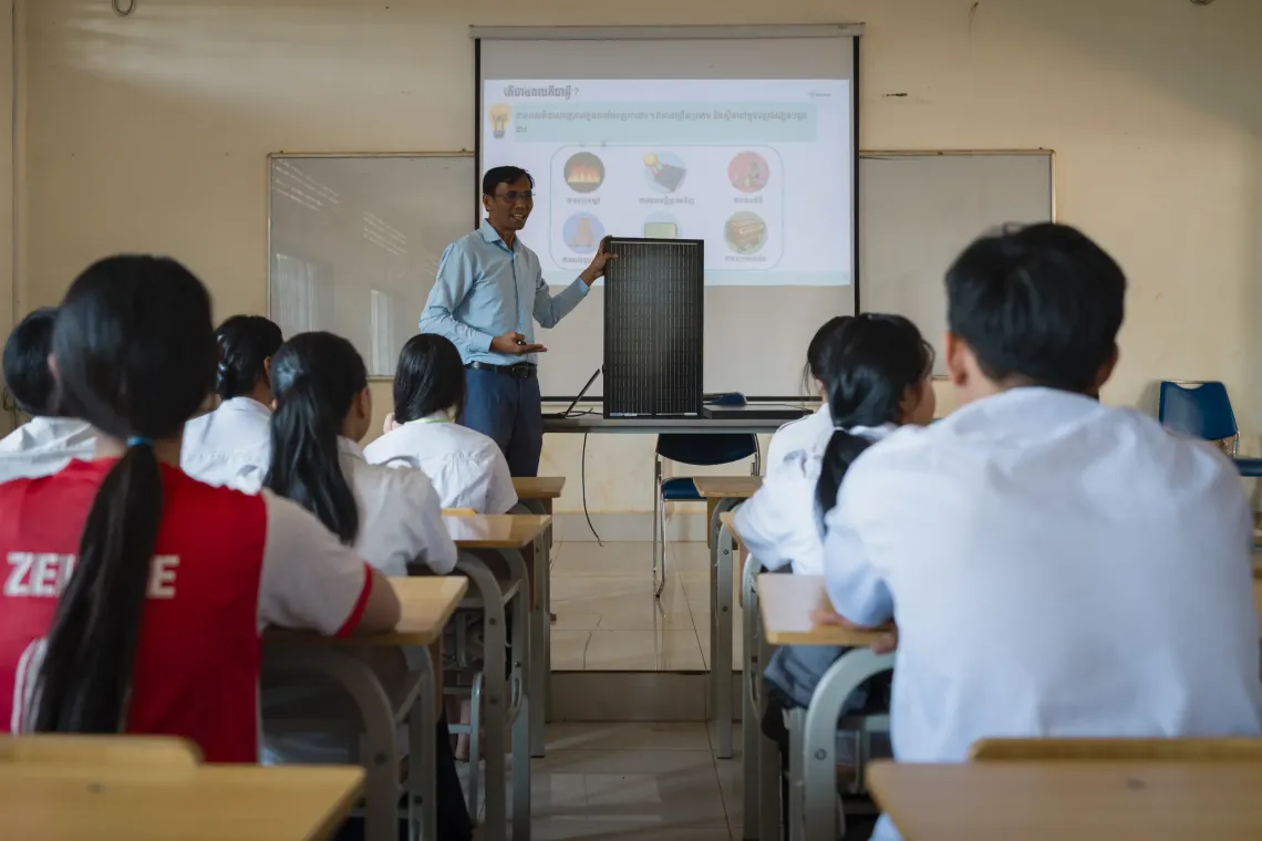 The students learn the fundamentals of climate change and renewable energy in the classroom before moving on to technical skills.