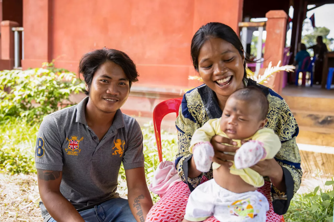 Yir Yean and her family as the wait to enroll in the Cash Transfer programme at  Chhouk Ksach commune. COVID-19 Cash Transfer is designed to respond to the needs of the most vulnerable groups of population, including the needs of children 0-5 years old.