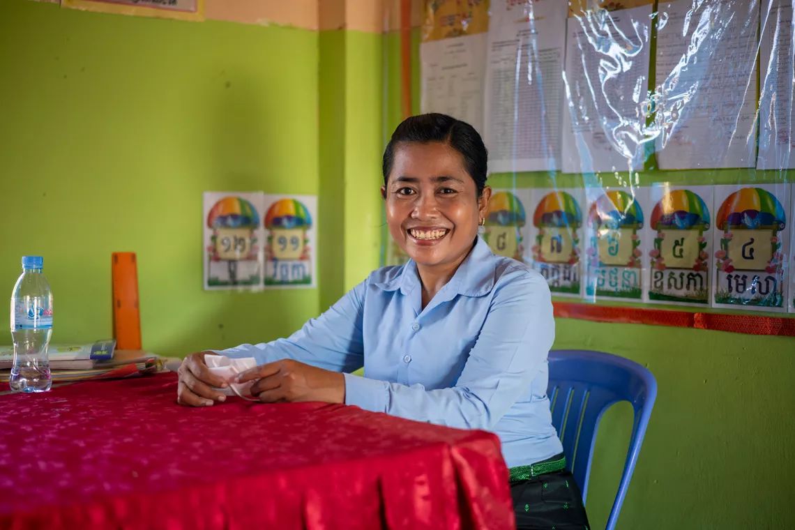02 November 2021, Bunrany Hun Sen Romeas Primary School, Sre Tachey Commune, Teuk Thos District, Kampong Chhnang,&nbsp;Cambodia. Portrait of Chhem Torn Sitha, female teacher, who worked hard throughout the pandemic to keep her children educated, even setting up Facebook Messenger groups to reach students who had moved with their families to Phnom Penh.