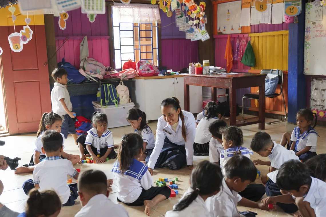 Pre-school teacher Som Dany runs a lesson using the China-provided materials 