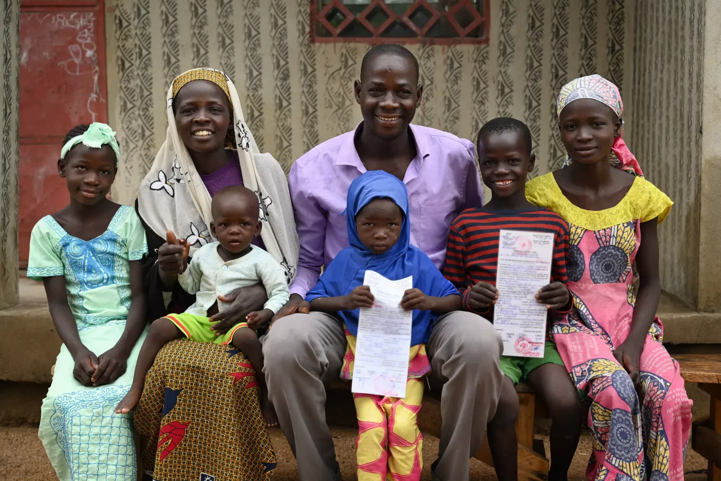 A family in Cameroon's Far North is delighted to see their children receive their birth certificates.