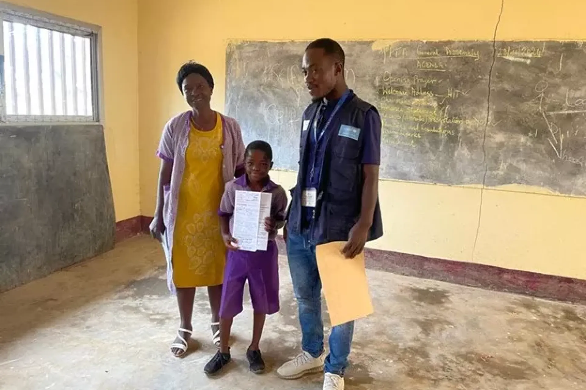 A young student is happy to receive his birth certificate in Northwest