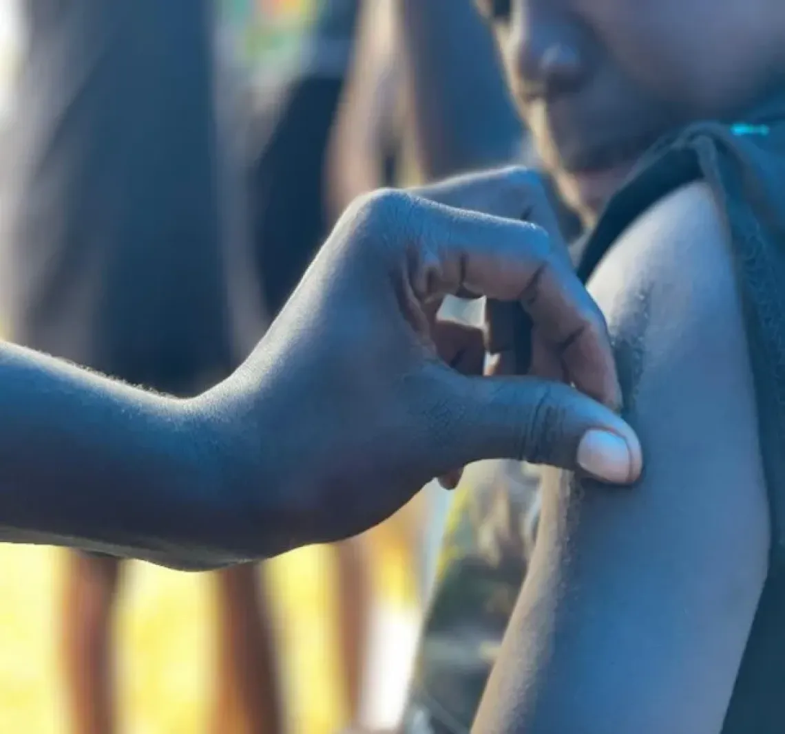 an adolescent girl receiving hpv vaccine in the east region of Cameroon