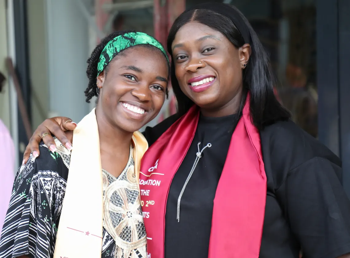 Mentor and mentee smiling together at MA COTA mentorship programme ceremony