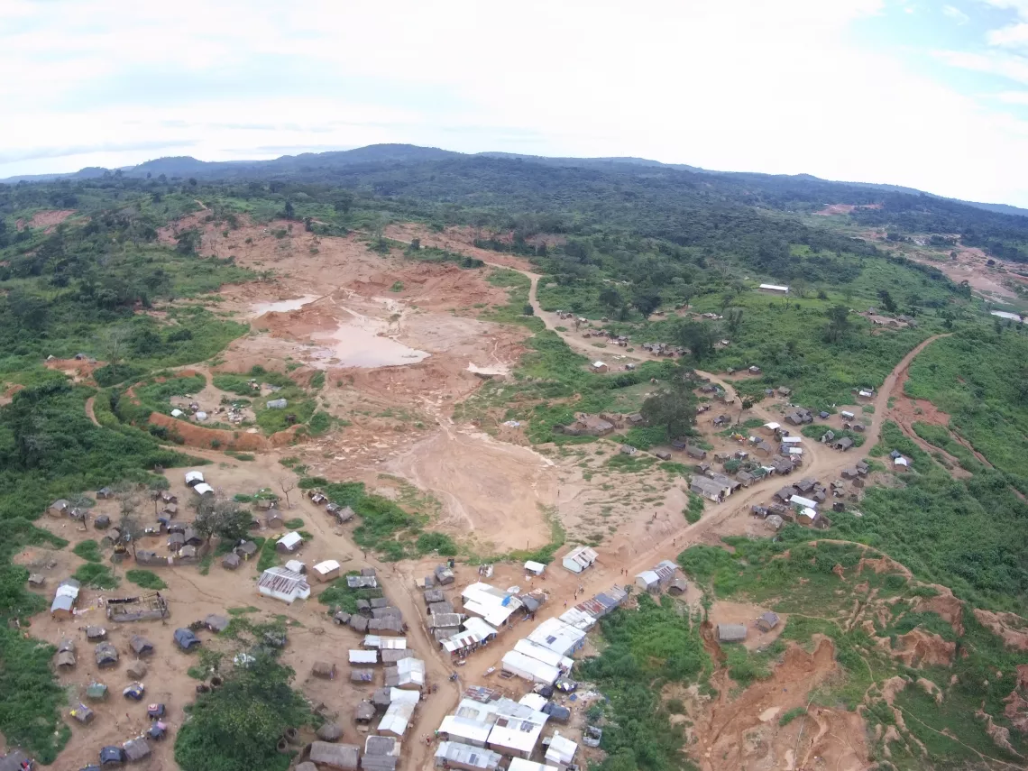 An aerial photo of Yassa Village and it gold pits