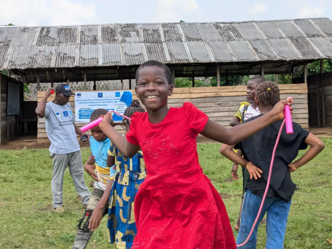 a young girl playin at a child-friendly space