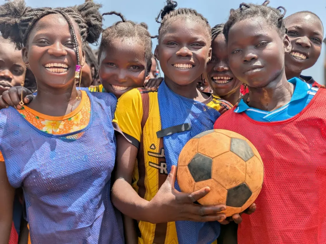 Prunelle (left) and Sentisia (right) are keen football players. They attend school at the Lycee CEG de Somboka.  