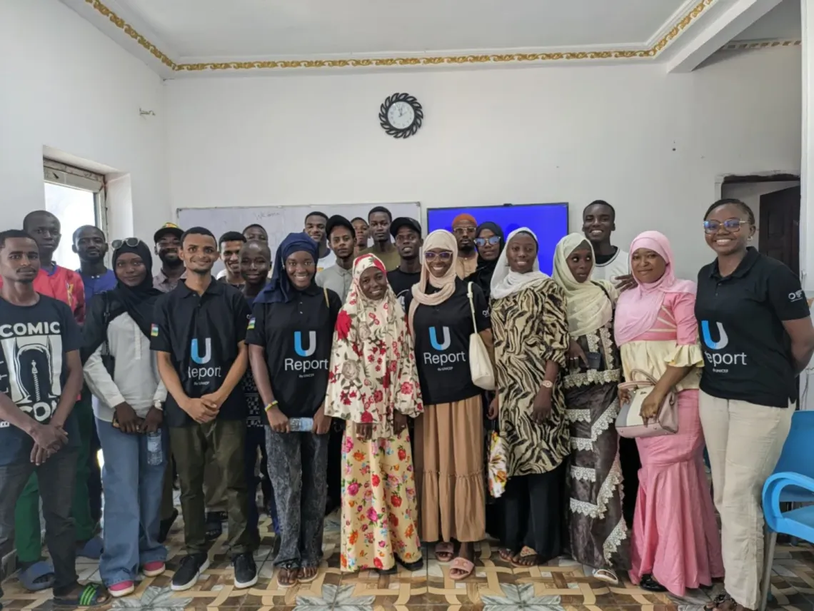 Some of the U-reporters trained on essential facts about polio and its vaccine stand for a group photograph in Bangui.  