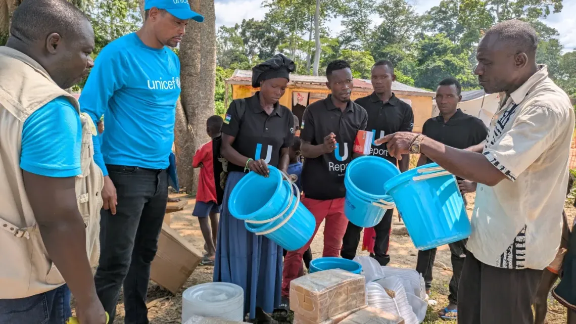 The UNICEF team hands hygiene kits in Mondoli village