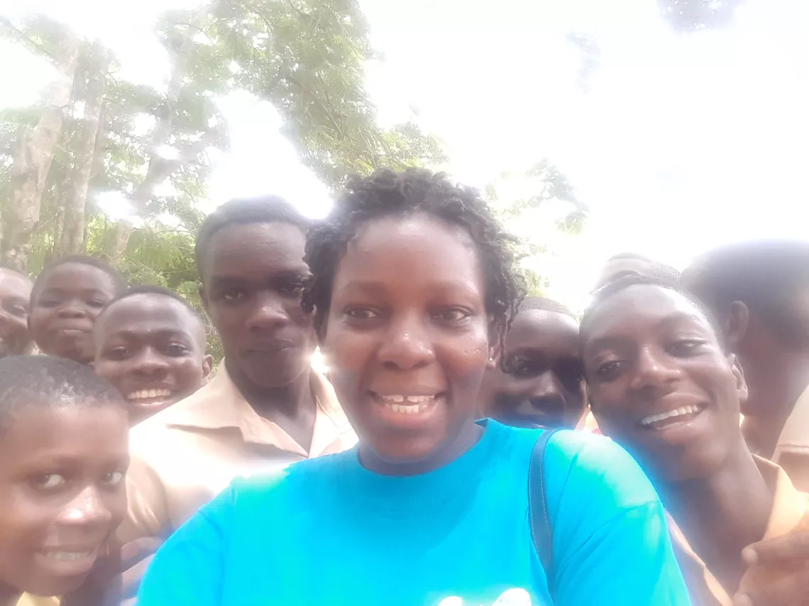 Anna Mensah surrounded by children