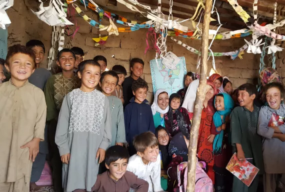 Adele, UNICEF Representative in Ethiopia, surrounded by children
