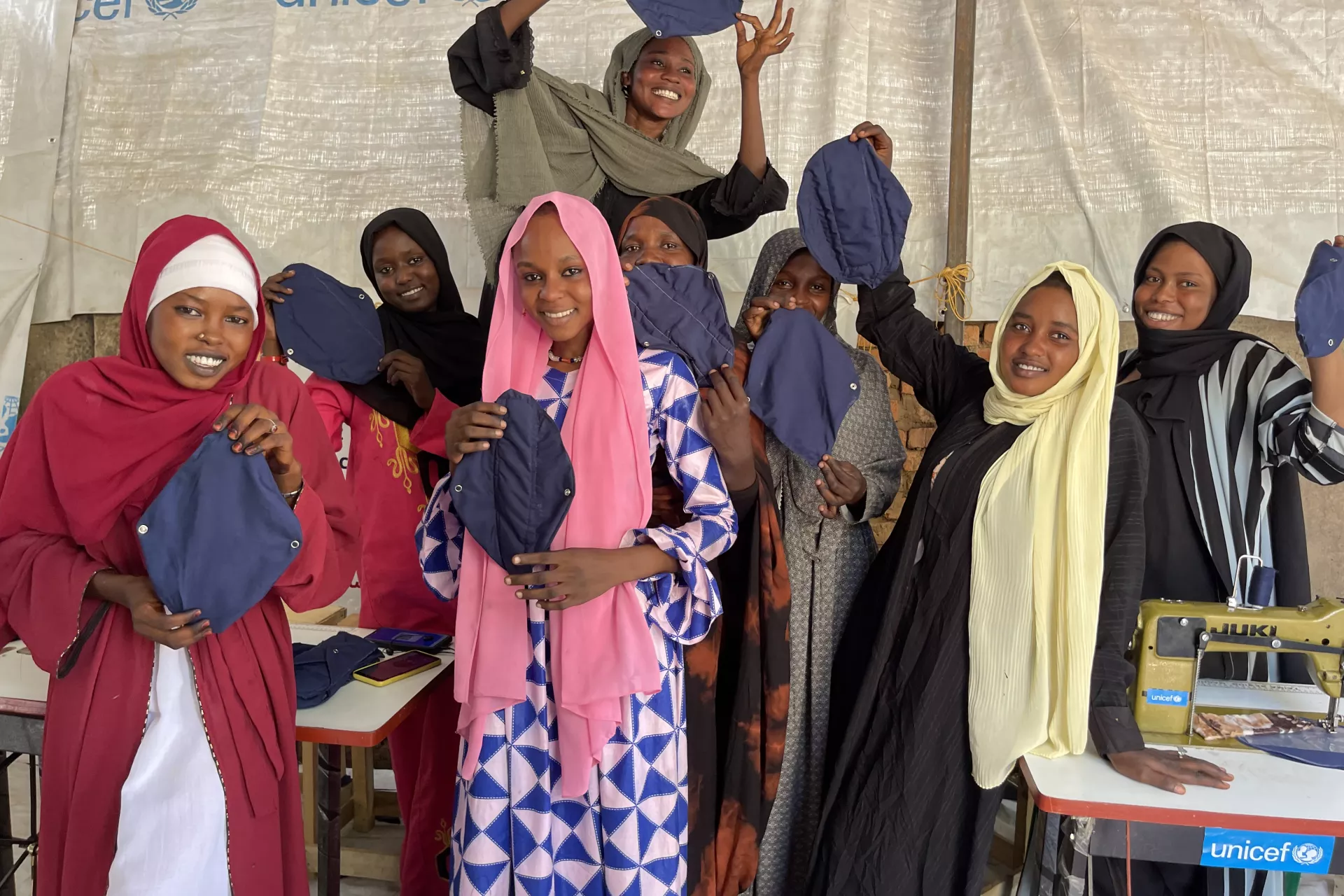 Ibtihal and his friends at the reusable sanitary pads manufacturing unit