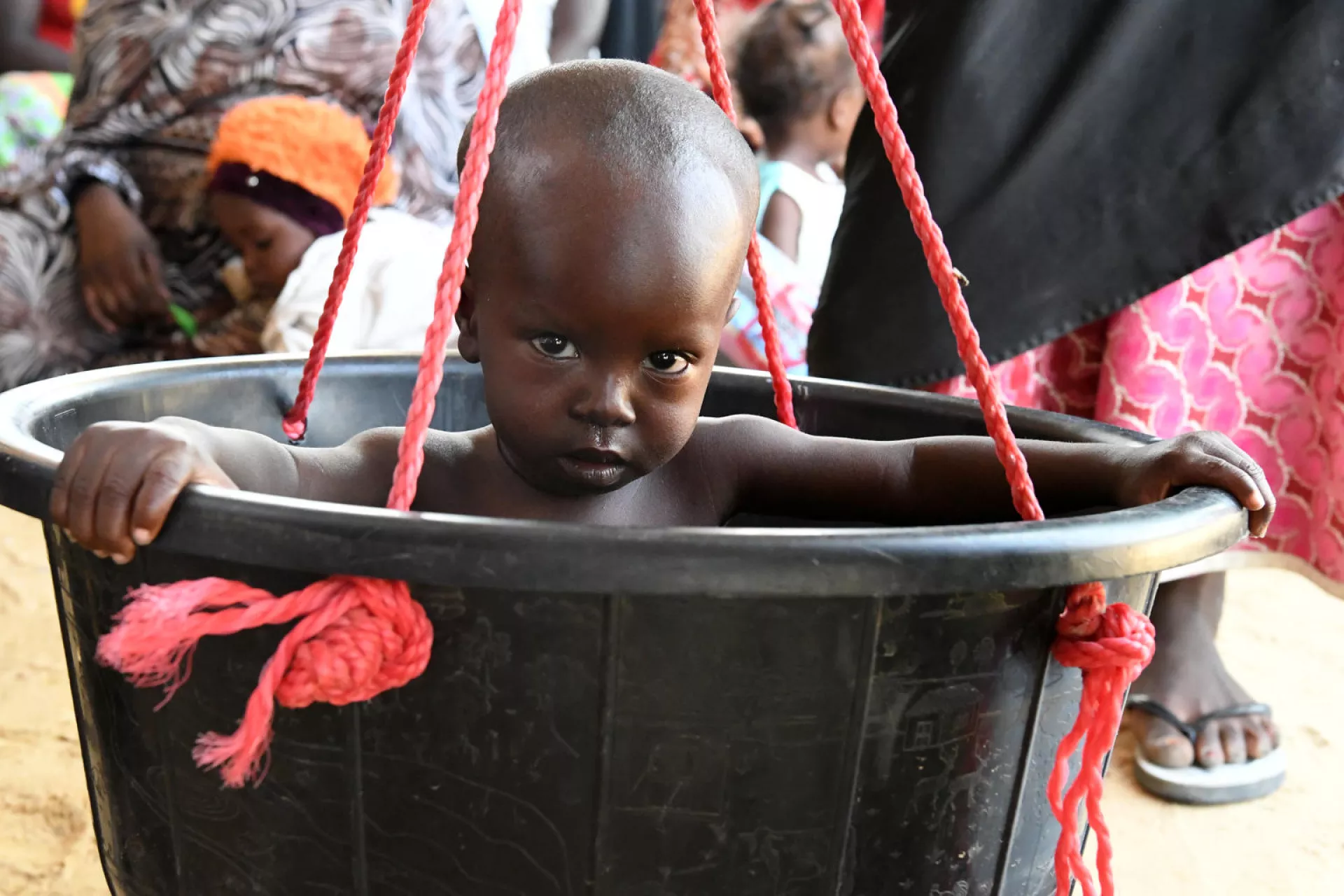 A baby is being weighted and measured  at the health center of Bethesda, a suburban of Ndjamena, the capital of Chad.  In Chad 13,5 of the children are suffering from acute malnutrition.   For every child, nutrition.