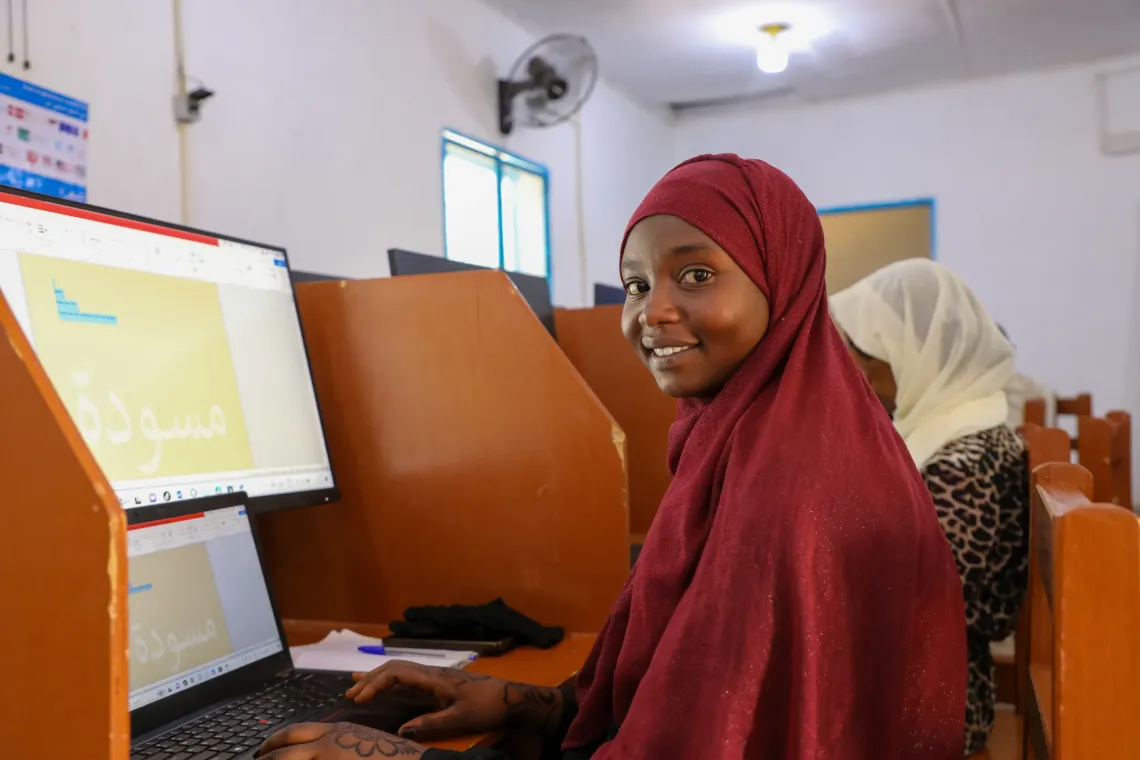 Through online research, Mayaz seeks opportunities that will enable her to pursue her studies and shape her future.