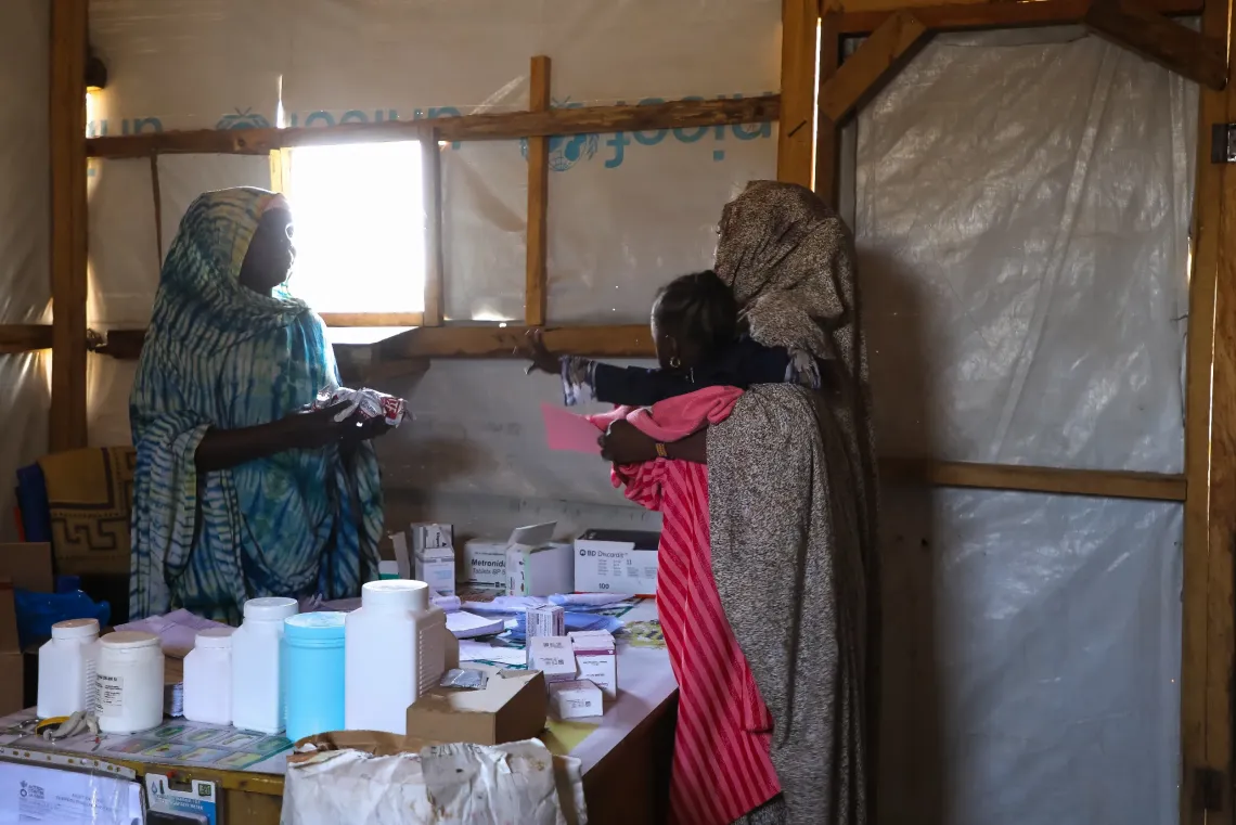 Alim&eacute; receives a supply of therapeutic food to continue Mahaza&rsquo;s treatment at home.