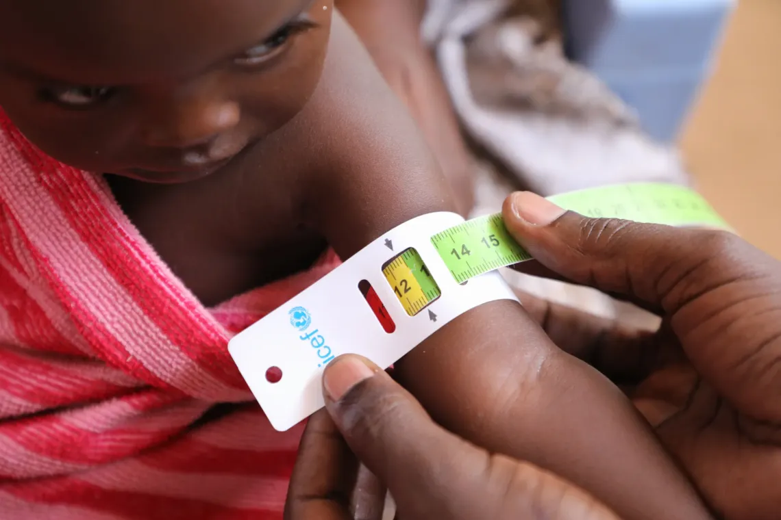 Her weight, her height, and then her mid-upper arm circumference are measured: Mahaza is examined with care.