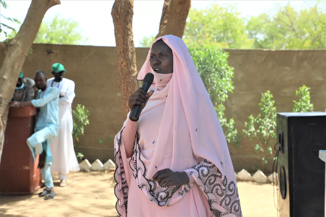 Kaltouma Amine, a mother and teacher giving a testimony during the certification ceremony of the End of Open Defecation in Tania 1 and Tania 2 districts in Bokoro, Hadjer Lamis Province, Central Chad.