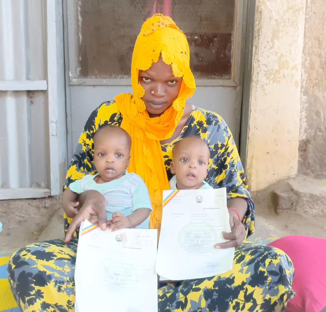 Two twins receive their birth certificates in N'djamena.