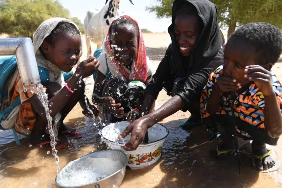 Children are washing their hands and refresh themselves  at a well nearby their school in the village of Gally, in the center of Chad.   In Chad, one in 17 children wash their hands with soap and water. Simply washing hands with soap and water can reduce by one-third the spread of diseases related to dirty hands such as diarrhea.  For every child, clean water and a clean environment.