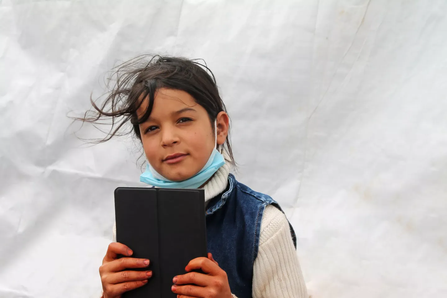  In Jordan, refugee children living in an informal tented settlement receive tablets and data bundles to support their learning during the COVID-19 pandemic and shift to distance learning.
