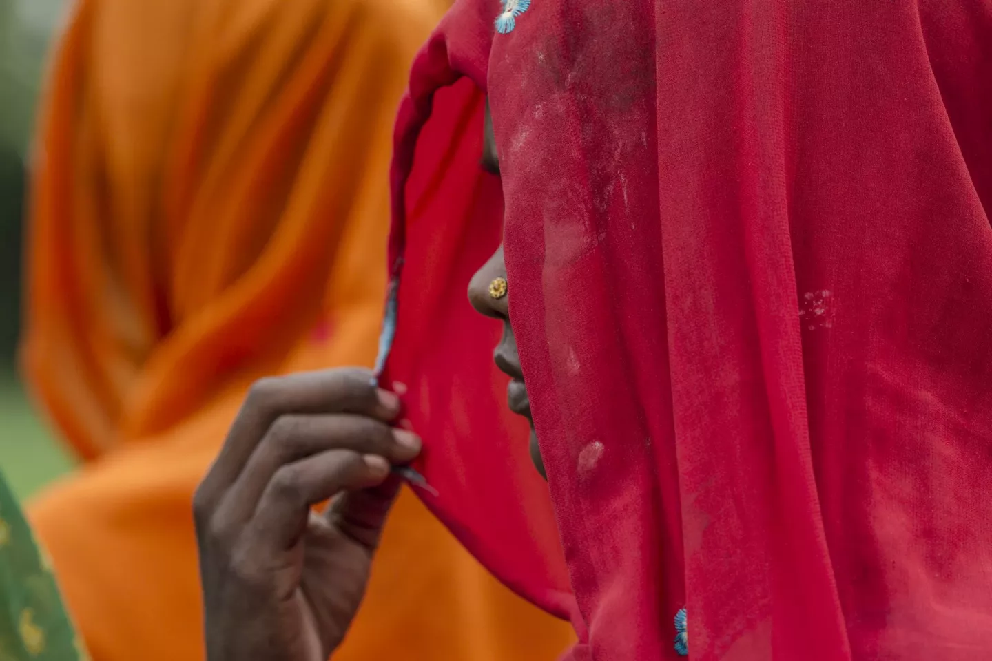 Women listen to members of Village Disaster Management Committee (VDMC).