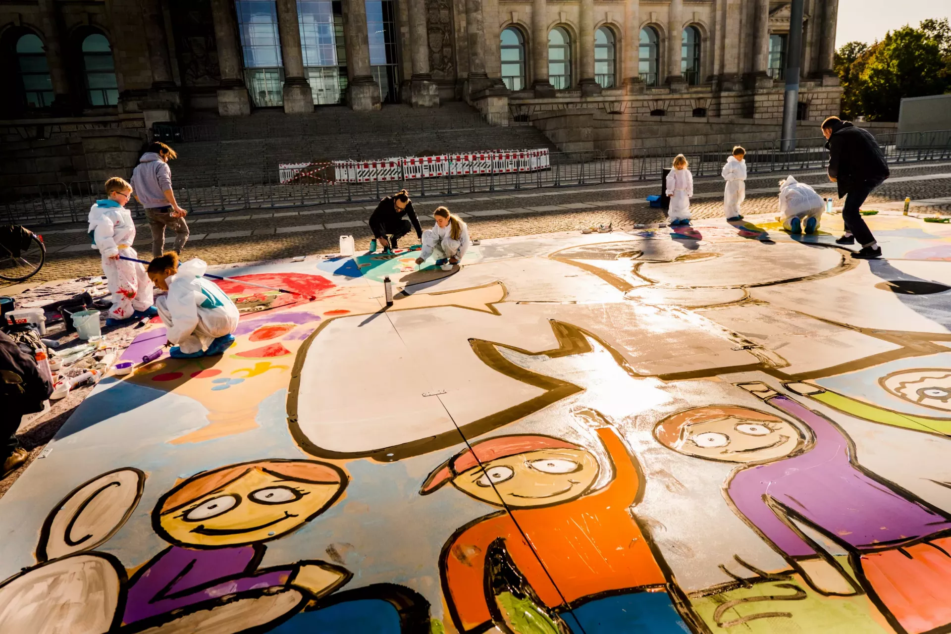Children from Berlin in front of the Reichstag building during the campaign for the World Children's Day 2020 by UNICEF Germany and the Deutsches Kinderhilfswerk (German Children's Fund).