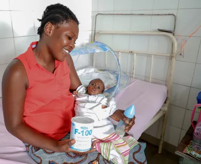 A malnurished baby with his mother