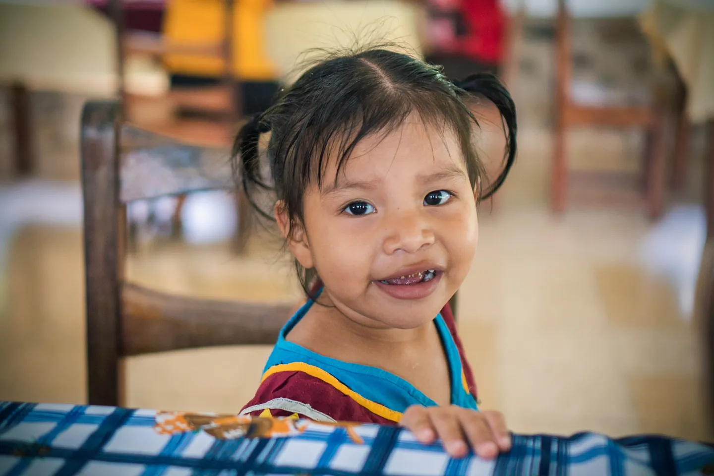 Toddler girl looking at the camera