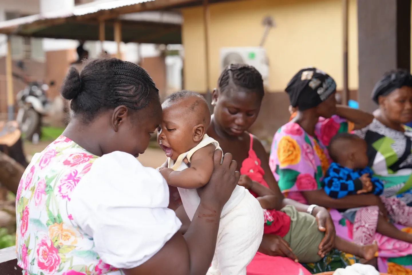 Mothers waiting for the digital birth registration in Sierra Leone
