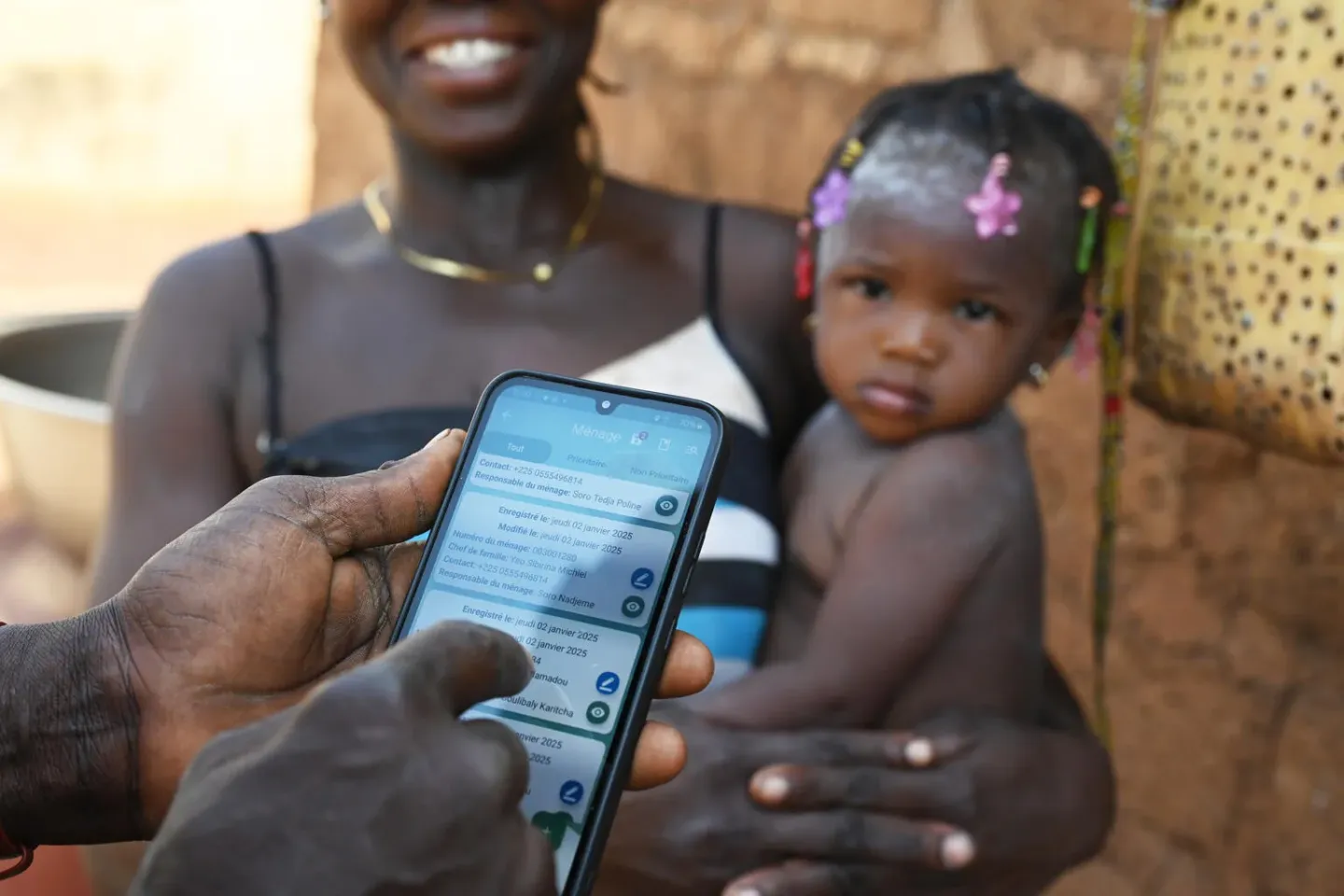 Digital health intervention in the village of Kafongo, in the North of C&ocirc;te d&rsquo;Ivoire.  Today, nurse Didier Coulibaly, visited the village for consultations and routine vaccination. Together with Yeo Kassoum, a community health worker, they do digital interventions.