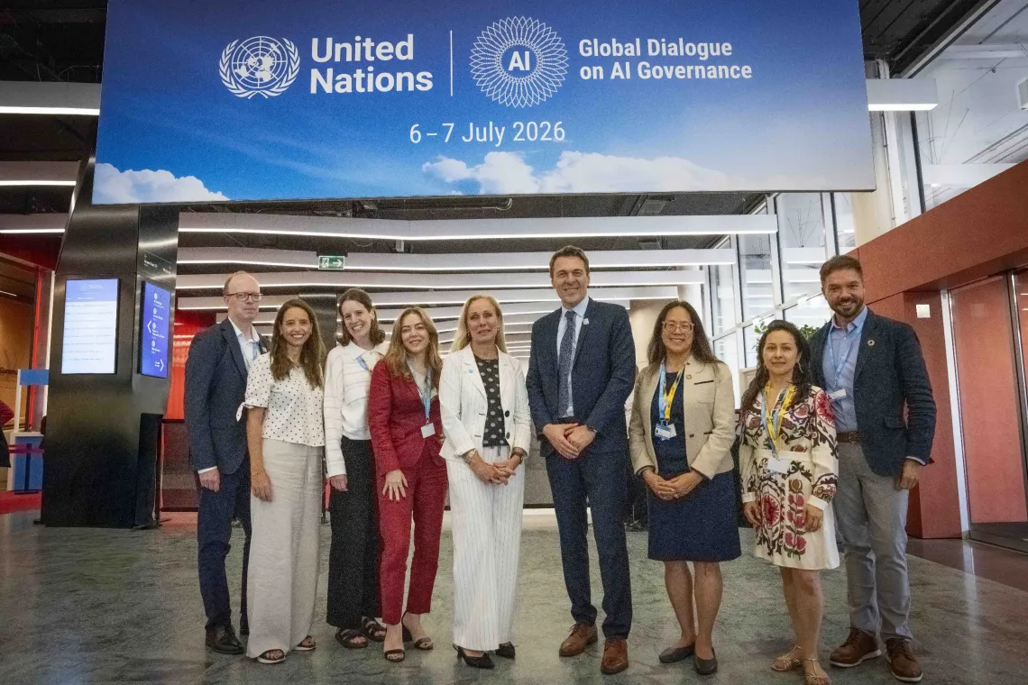 Kitty van der Heijden, UNICEF&rsquo;s Deputy Executive Director (centre) with the UNICEF team at the Global Dialogue on AI Governance.