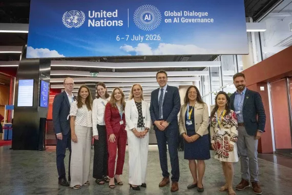 Kitty van der Heijden, UNICEF&rsquo;s Deputy Executive Director (centre) with the UNICEF team at the Global Dialogue on AI Governance.