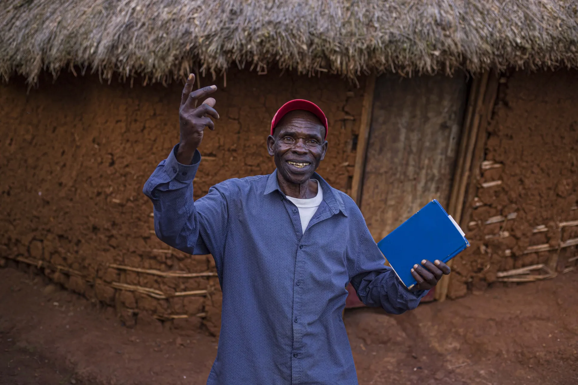A man holding a notebook