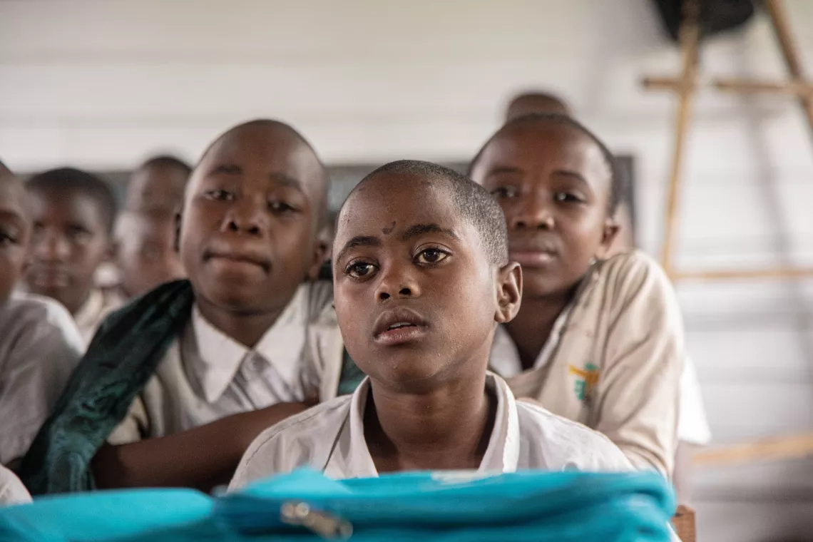 A child sitting in a classroom