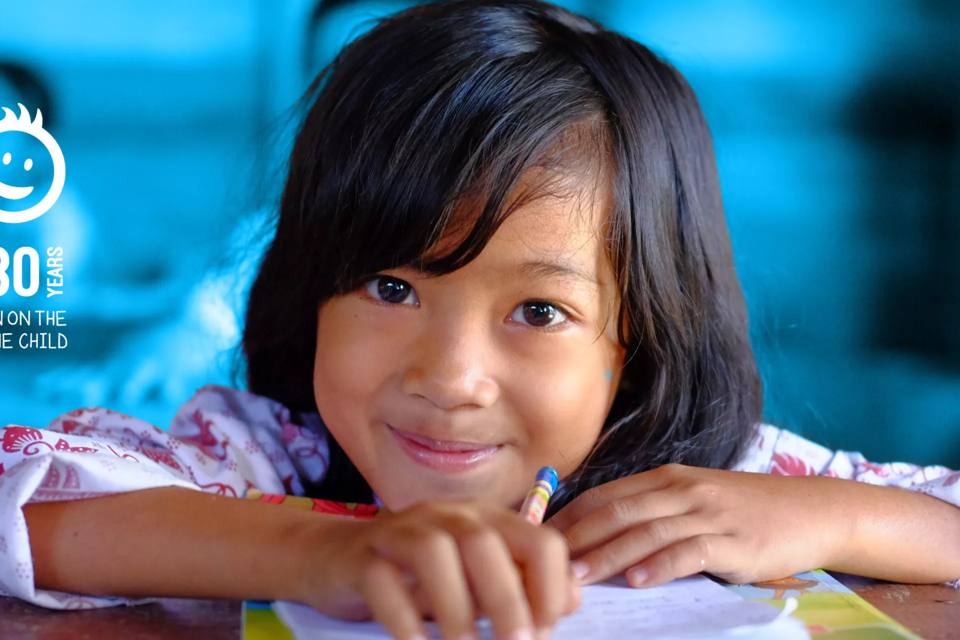CRC logo with school girl smiling 
