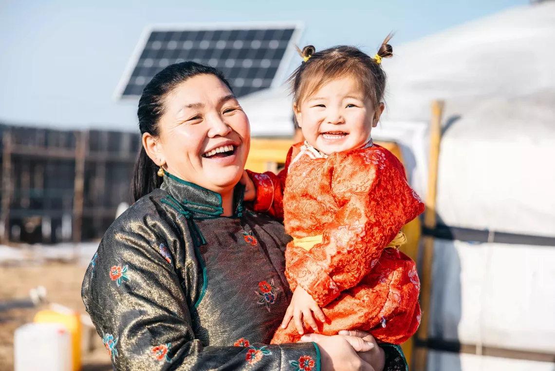 Munkhsurn and her daughter in front of the family ger