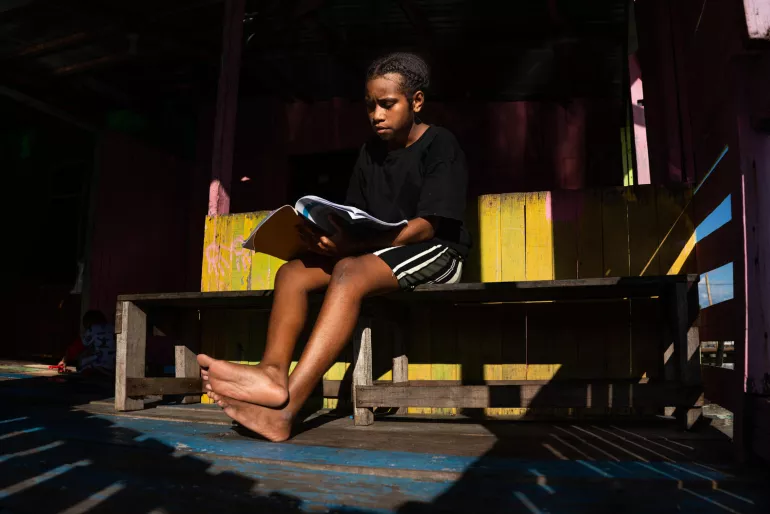 14-year-old studying at home