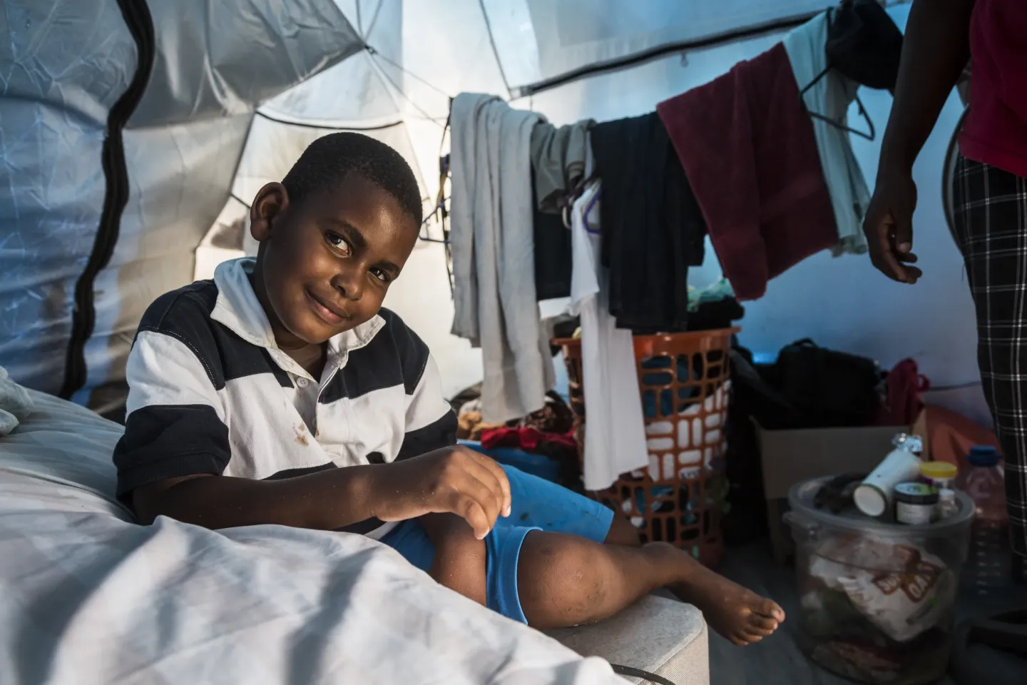 Photo of boy in hurricane context