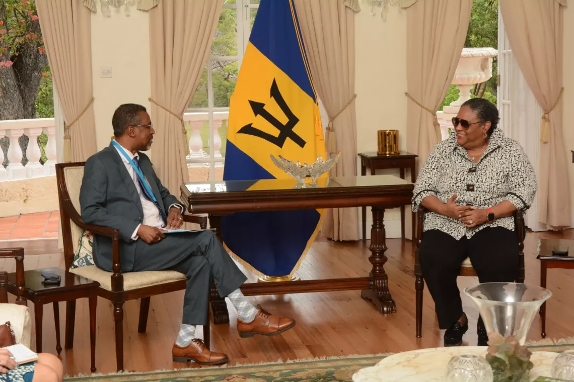 PM Mottley sitting across the table from AK