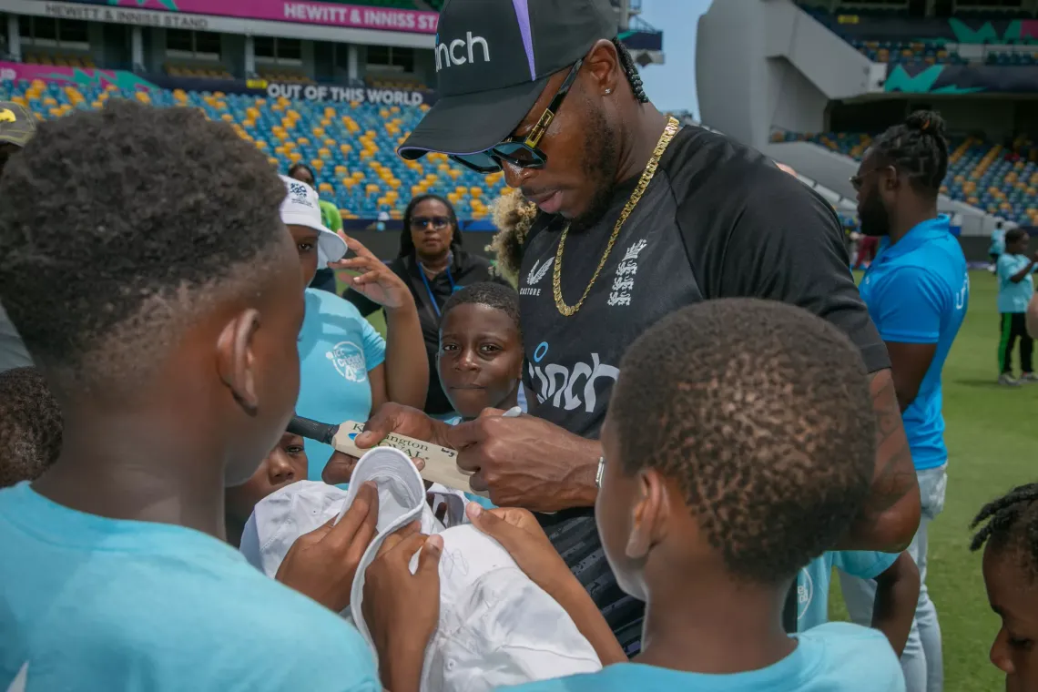 Jofra signing autographs