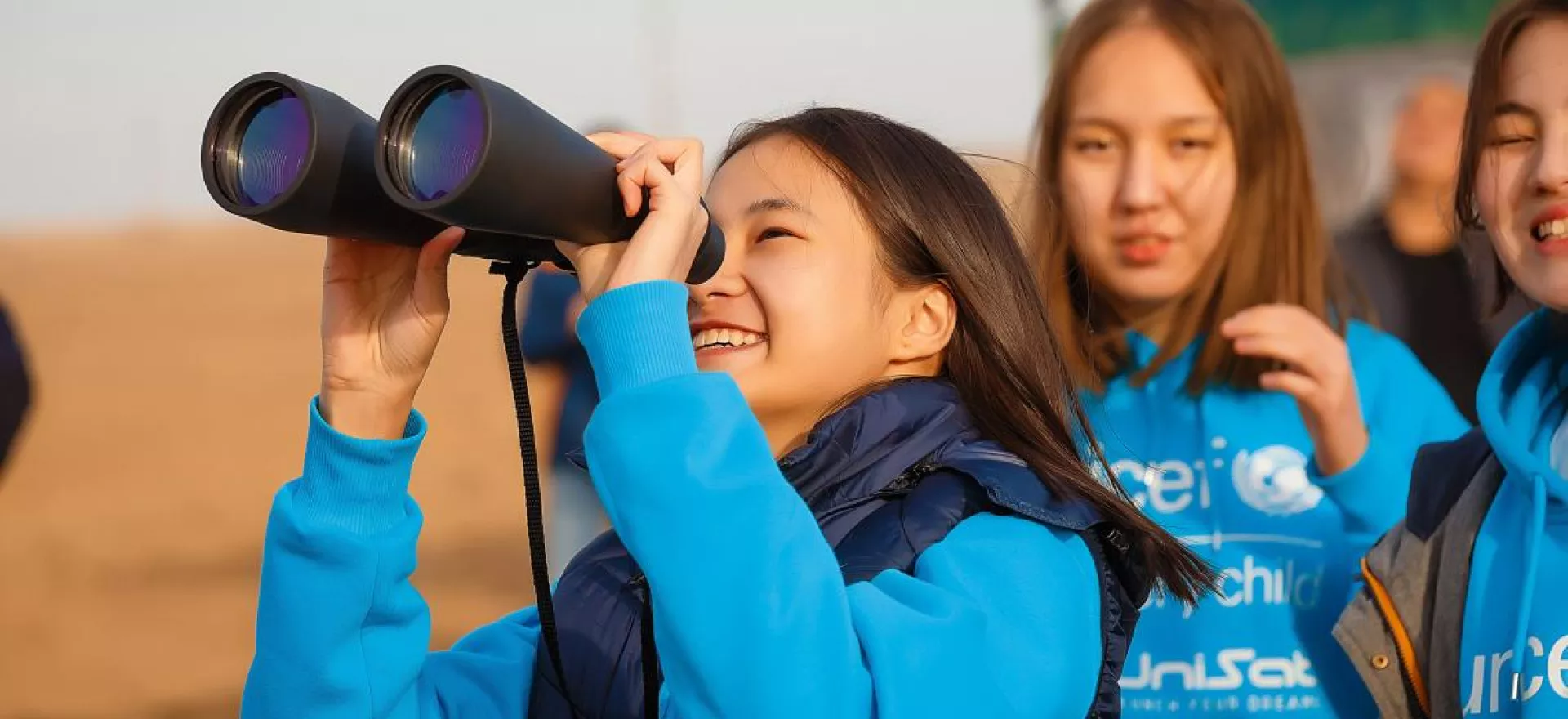 girls build satellites in Central Asia