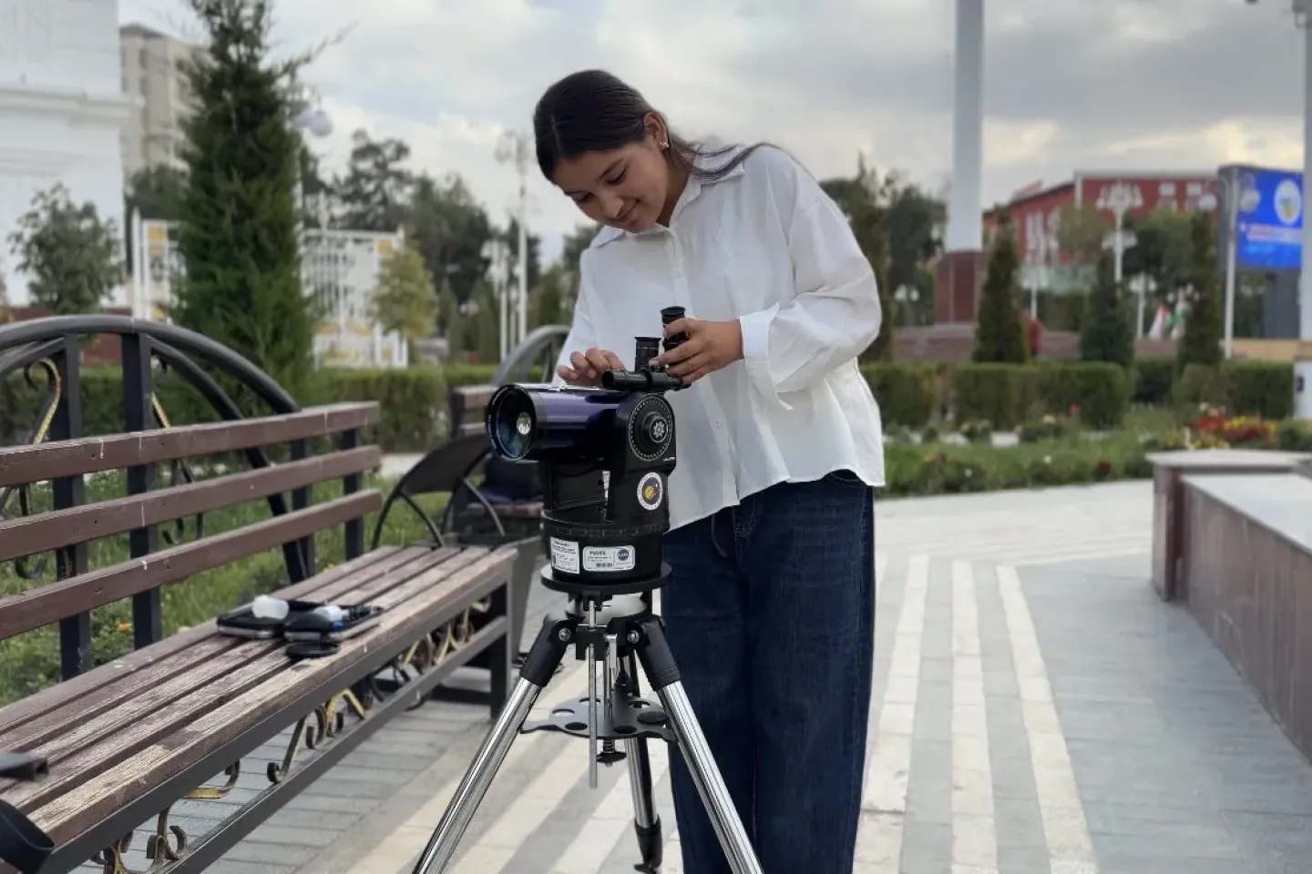 Sumaya with a telescope during one of the sessions on astronomy
