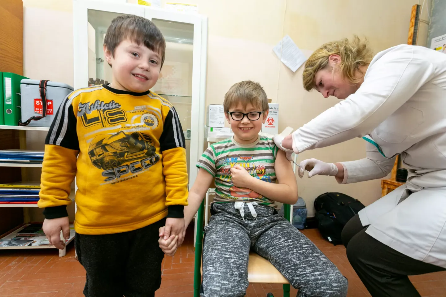 A boy receives a vaccine.