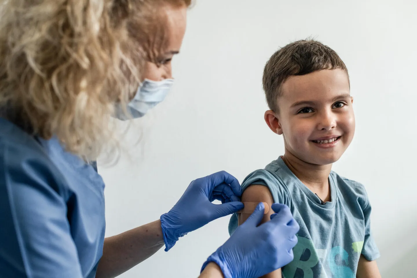Boy in Poland receives a vaccine. 