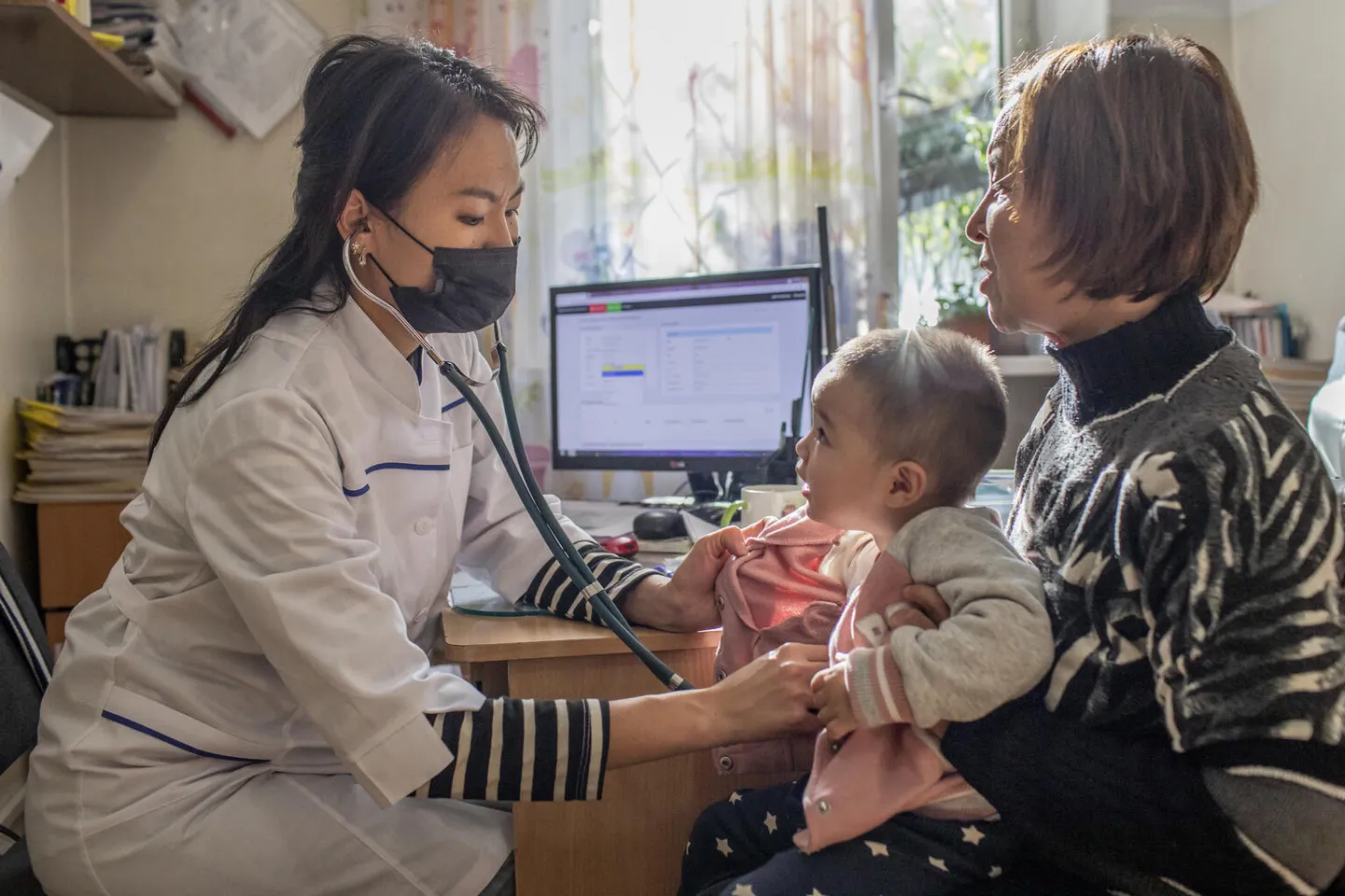 A child  is examined by her paediatrician