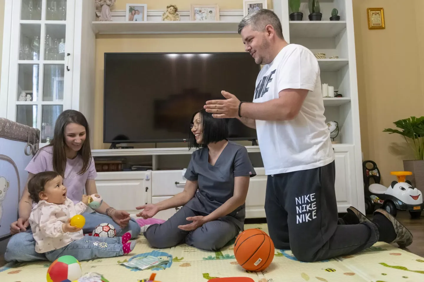 May 2023. Nurse Jasmina Birta (centre) visits the Jovanov family &ndash; Jovana, Borivoj and their 11-month-old baby Marta in Vrsac, Serbia. 