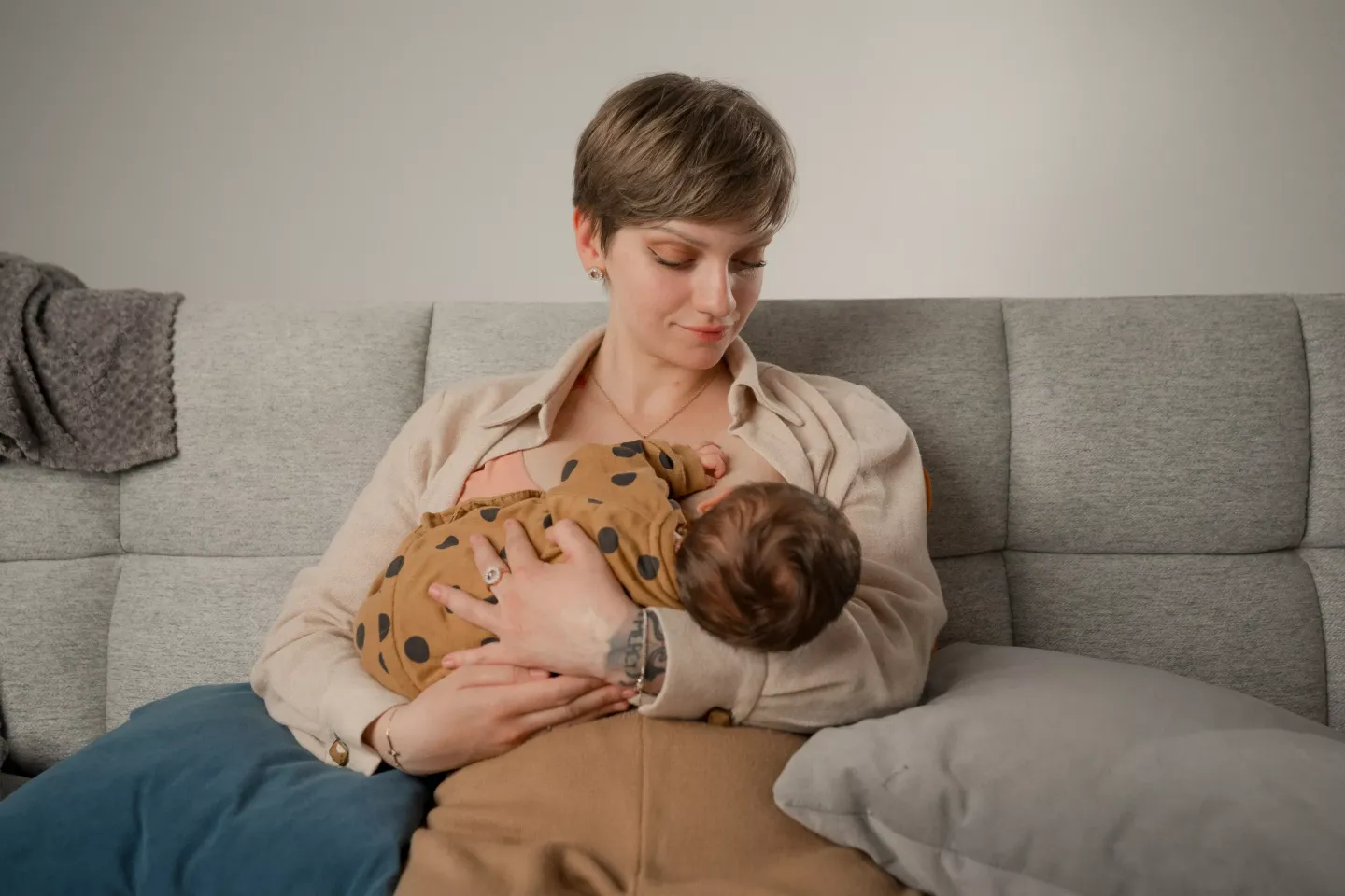 Irina from Moldova is breastfeeding her three-week-old daughter