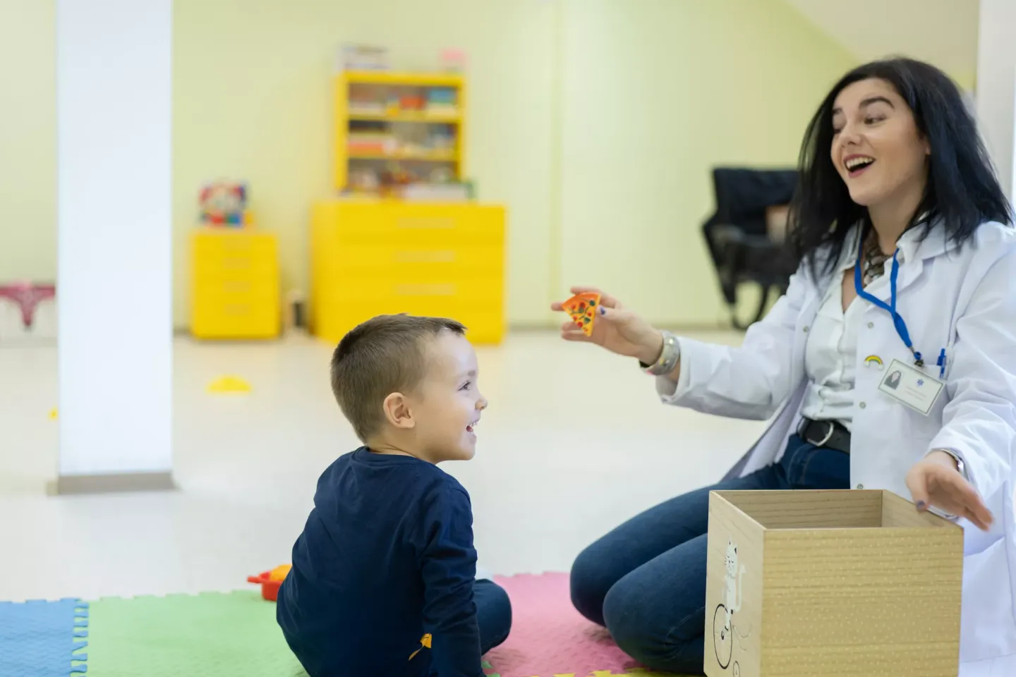 Amar laughs with his speech therapist at the Centre for Early Childhood Development in Maglaj, Bosnia and Herzegovina, which is part of the local Health Centre. 