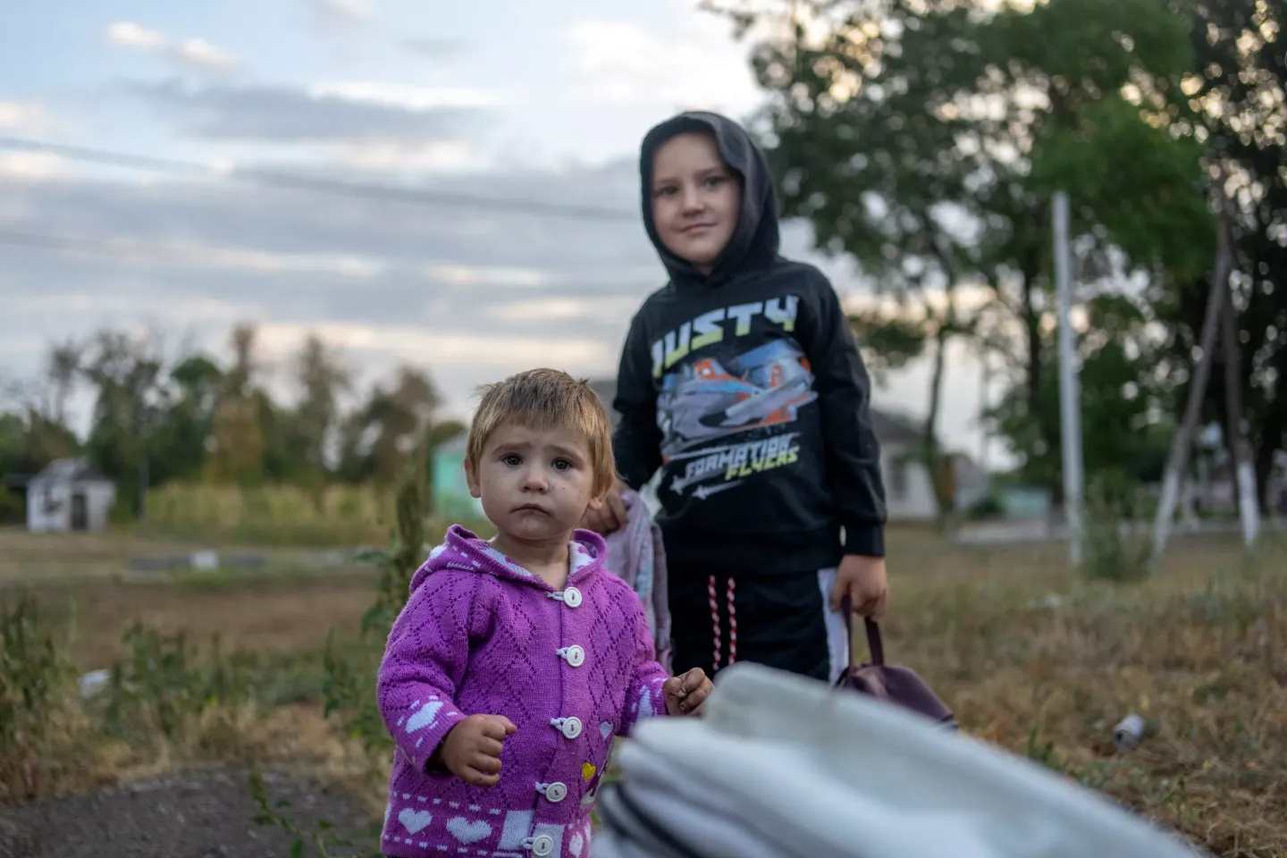 Two children in a backyard